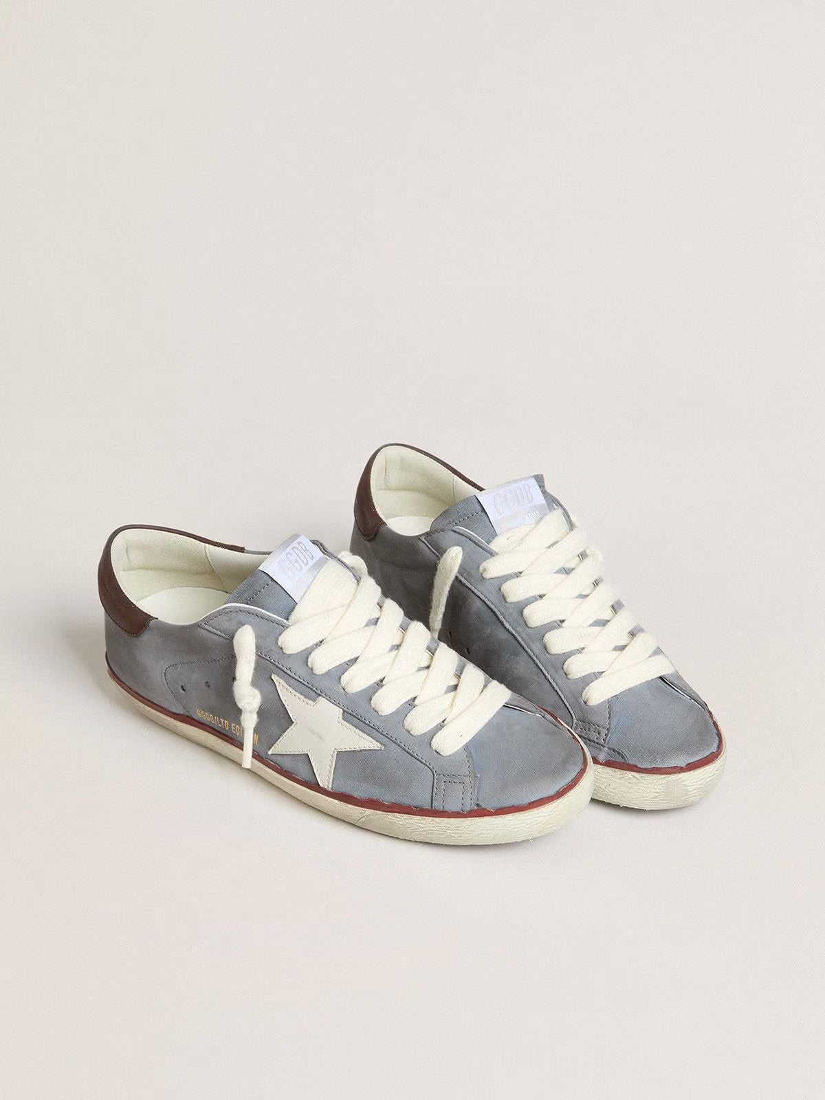 Light blue nubuck leather LTD with white leather star and brown leather heel tab