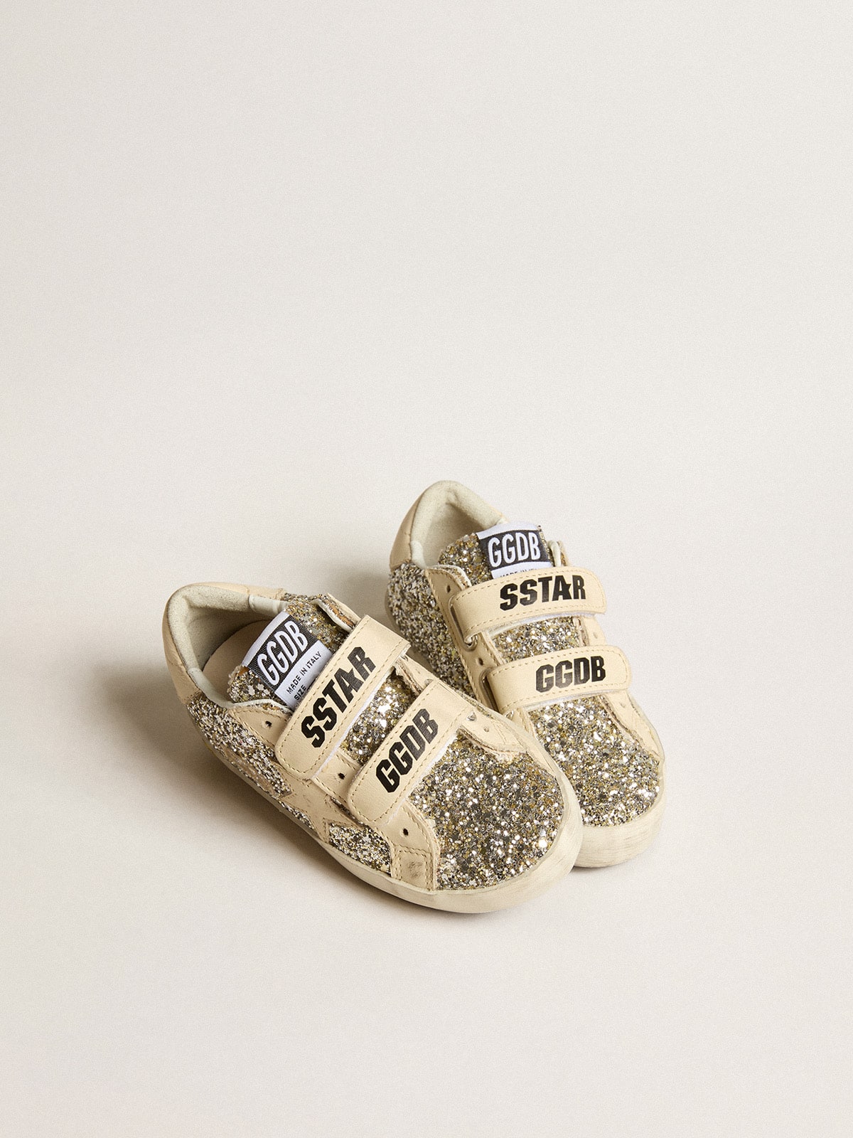Old School Young in glitter platino con stella e talloncino in pelle