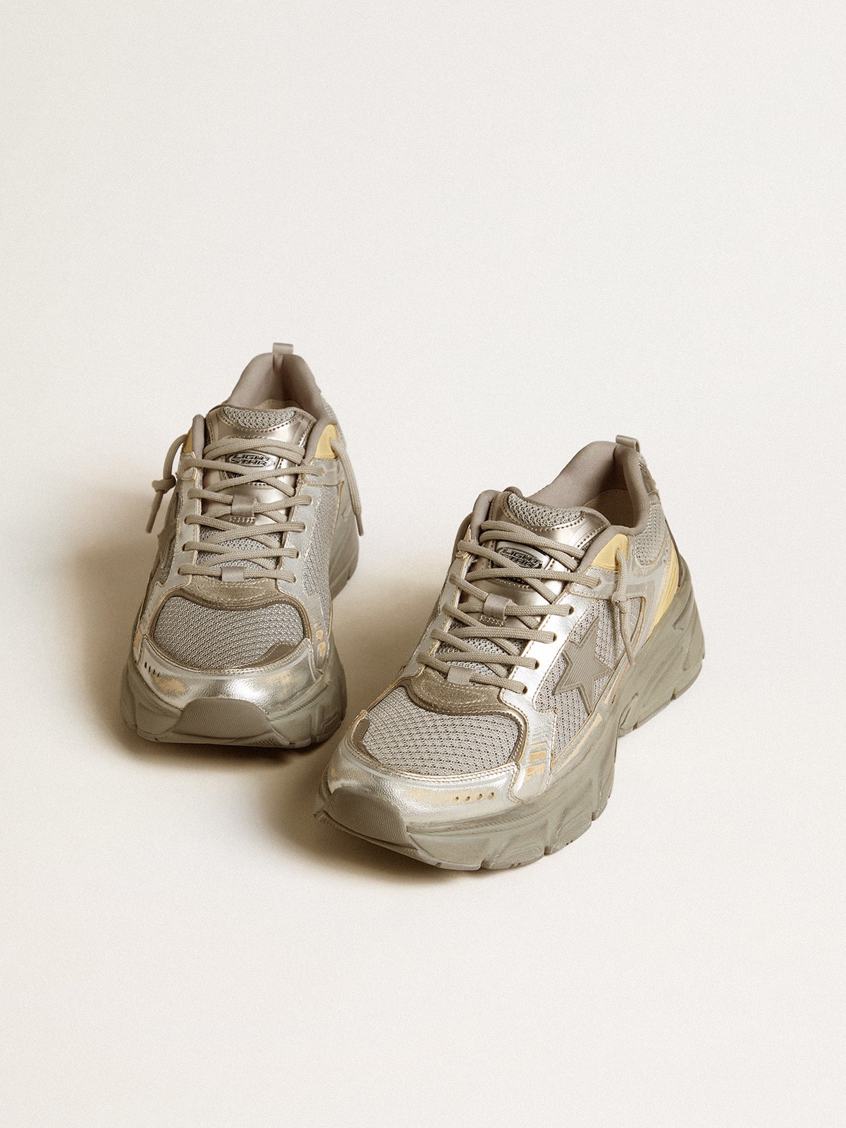 Lightstar in laminated silver leather and mesh with a grey star