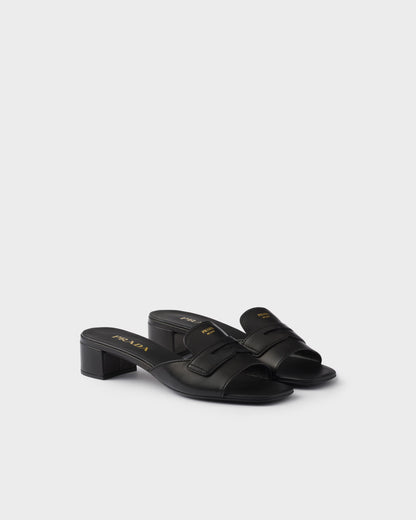 Black leather low-heeled slider sandals