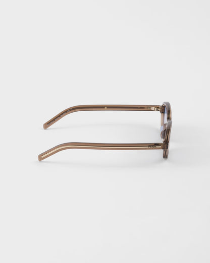 Sonnenbrille mit ikonischer Metallplakette und Cristal Ultraviolet Gläsern