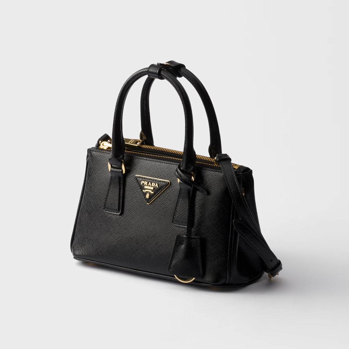 Mini Galleria bag in black patent Saffiano leather