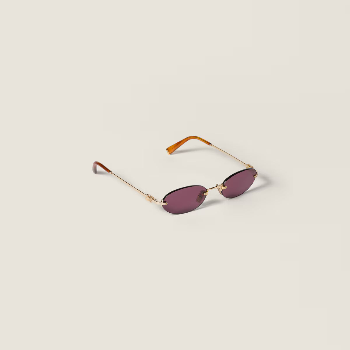 Ruby rimless oval lens sunglasses