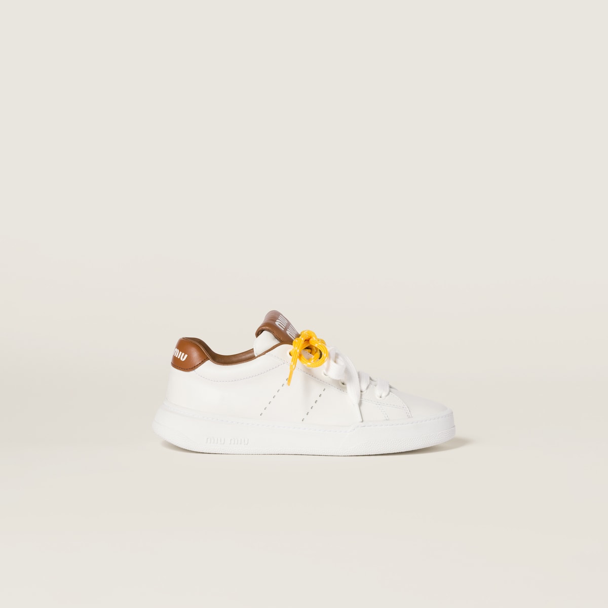 White/brown leather sneakers