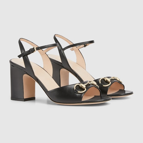 Women's black leather heeled sandal with snaffle