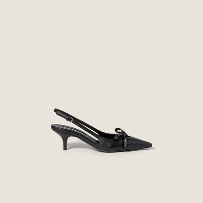 Black leather slingback pumps with bow
