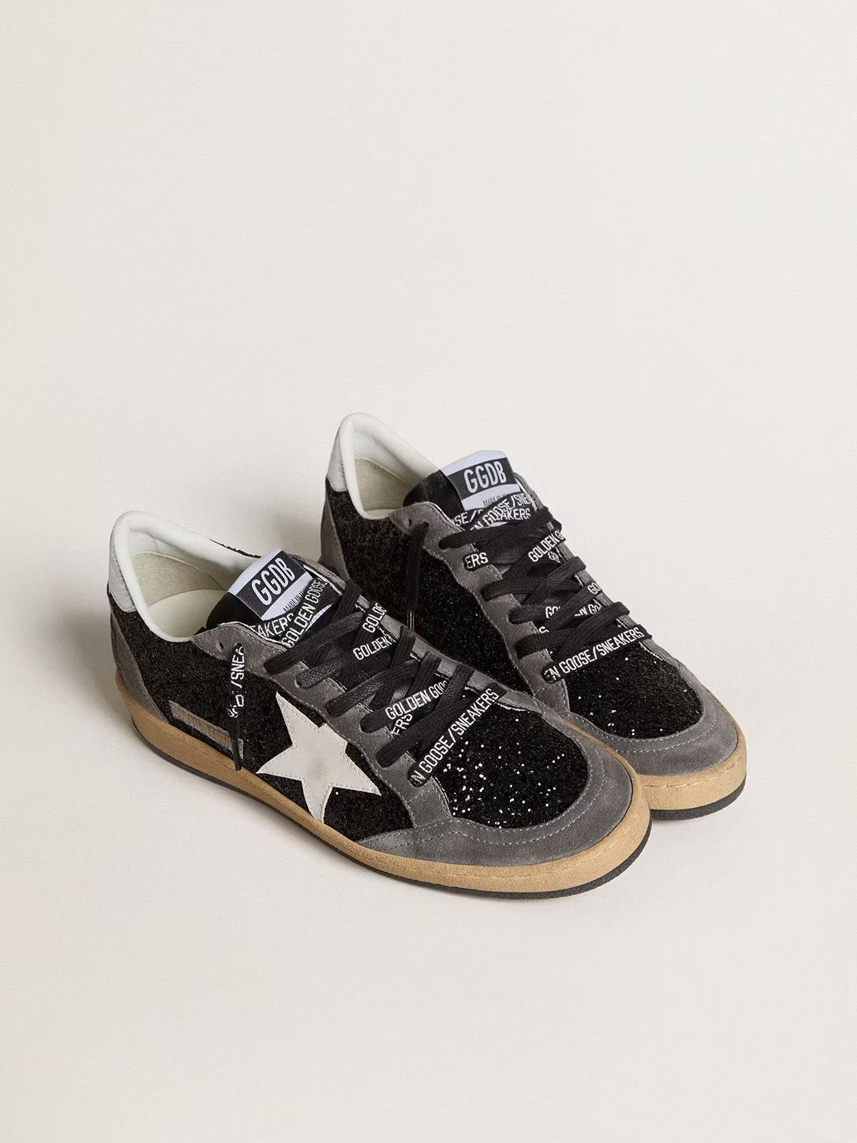 Glitter with leather star and laminated leather heel tab