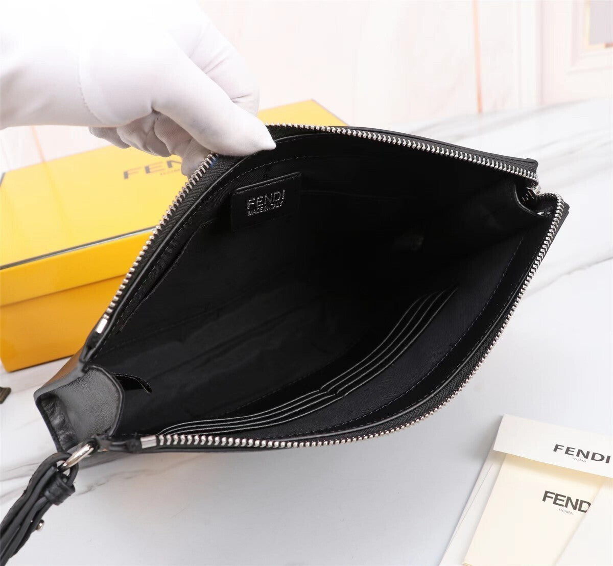 Borsa a marsupio Clutch nera e gialla