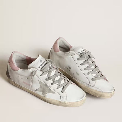 Stella in suede grigio e talloncino in pelle rosa