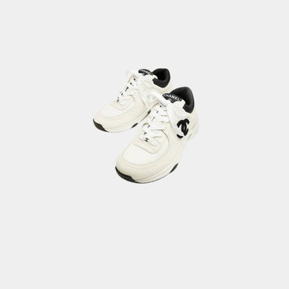 White/black mesh suede sneakers
