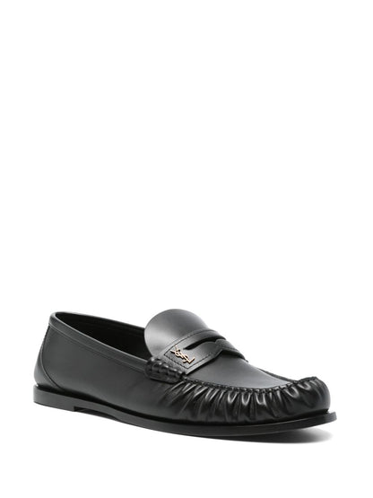 Black leather loafers