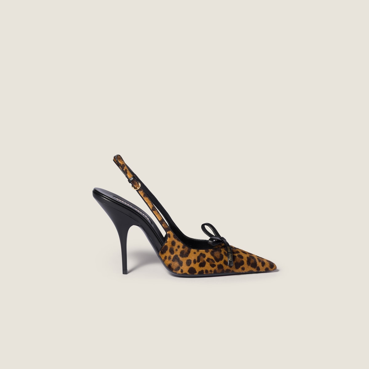 Honey-colored printed leather slingback pumps with bow
