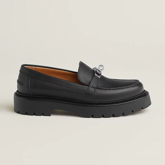 Schwarze Lederloafer-Ikonen