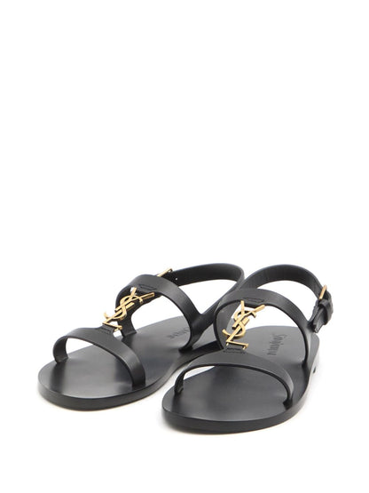 Cassandre buckled slingback sandals in black leather