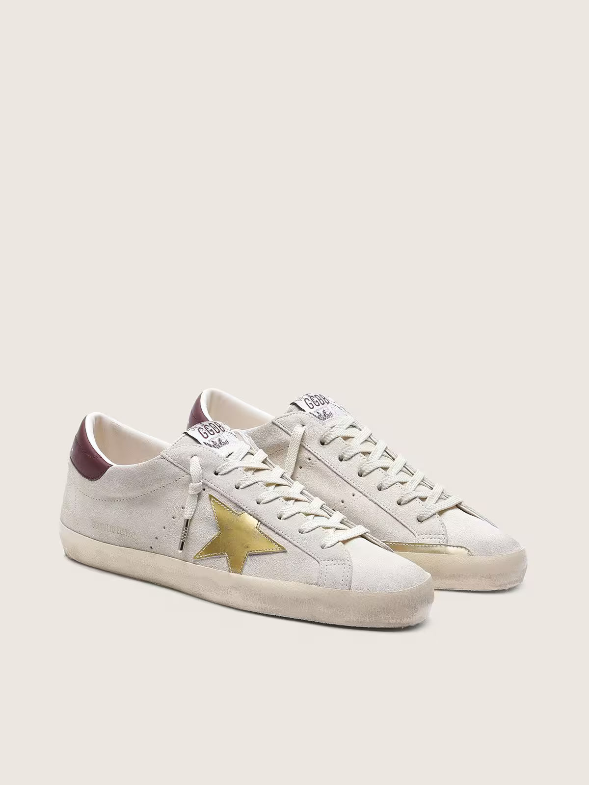 Ivory suede with laminated leather star and leather heel tab