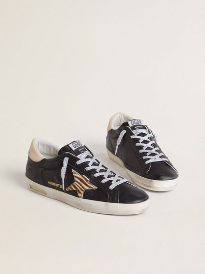 Black nappa leather with zebra-print pony skin star and beige leather heel tab