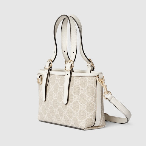 GG Emblem mini bag in beige and white fabric