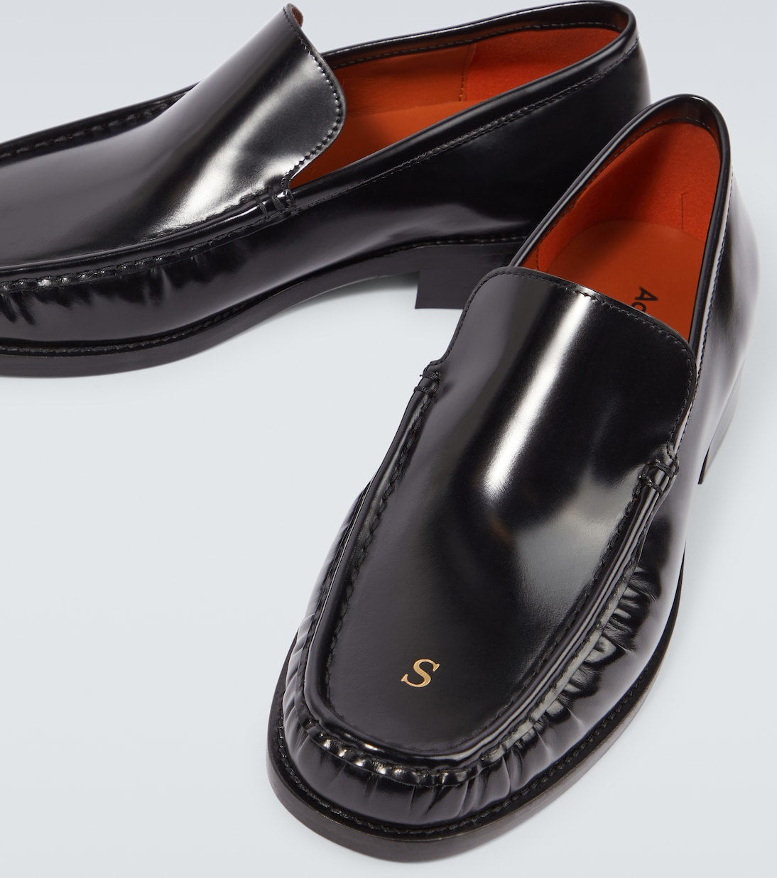 Black leather loafers