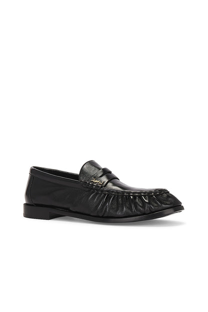Black leather loafers