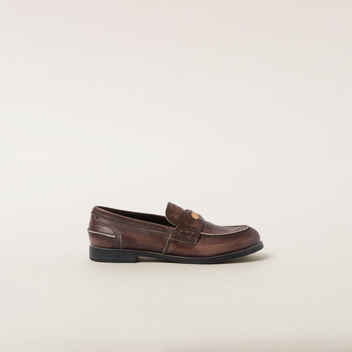 Brown vintage-effect leather loafers