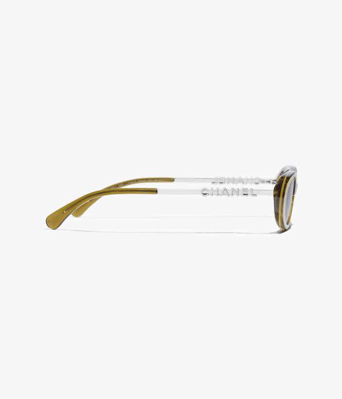 Occhiali da sole ovali in acetato e metallo color oliva con lenti marrone scuro
