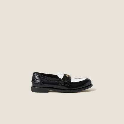 Black/white leather loafers
