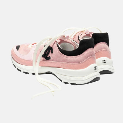 Pink/black suede sneakers
