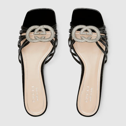 Women's slider sandal with GG criss-cross and crystals in black patent leather
