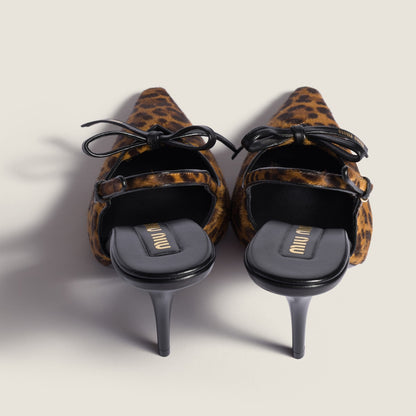 Honey-colored printed leather slingback pumps with bow