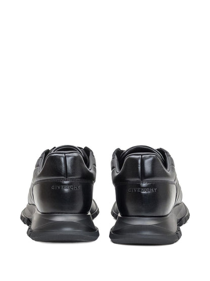 Black quilted leather sneakers
