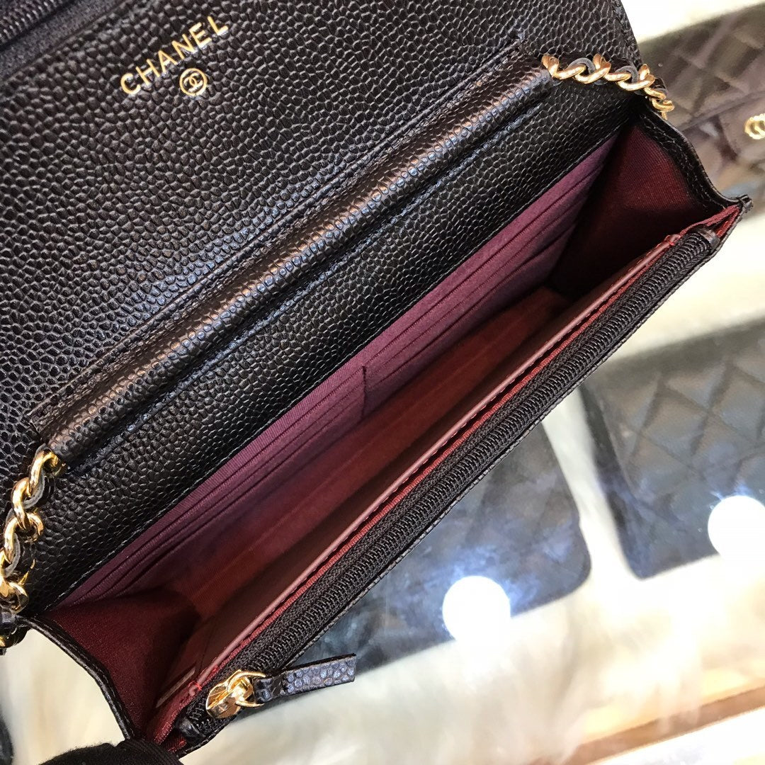 Black wallet with chain and gold logo