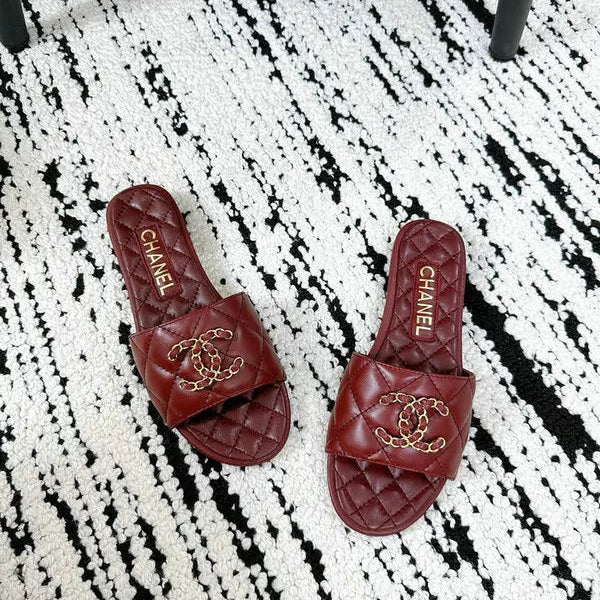 Burgundy quilted leather slides with interwoven C logo