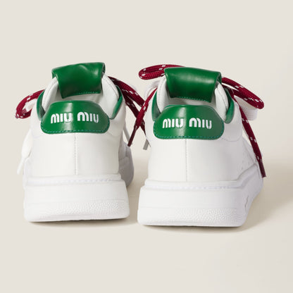 White/green leather sneakers