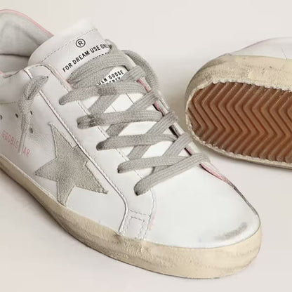 Stella in suede grigio e talloncino in pelle rosa