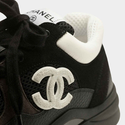 Black/white mesh suede sneakers