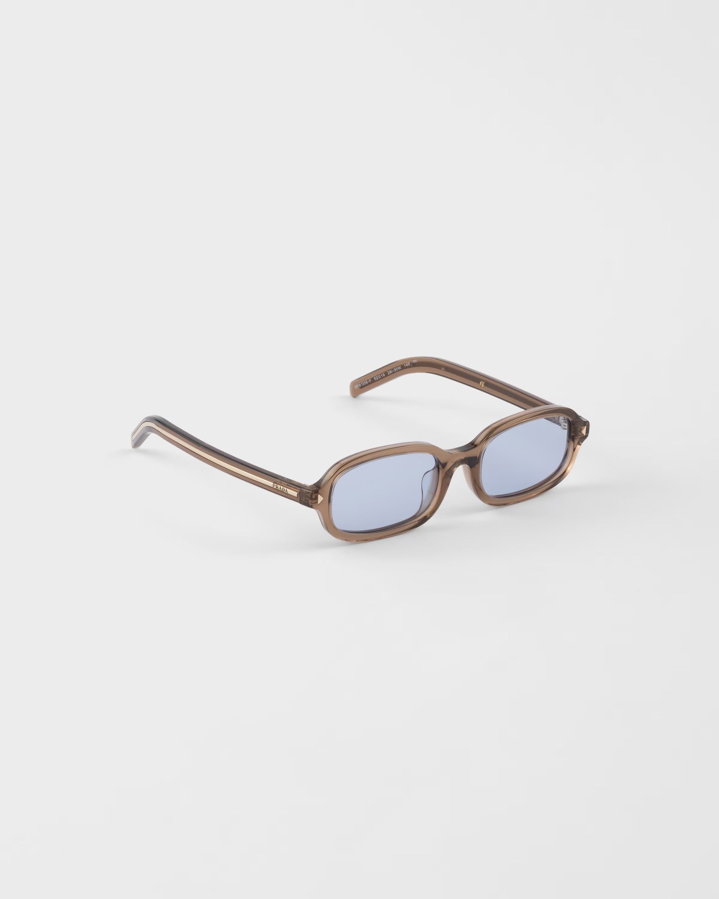 Sonnenbrille mit ikonischer Metallplakette und Cristal Ultraviolet Gläsern