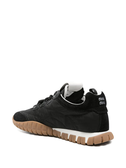 Black panelled trainers