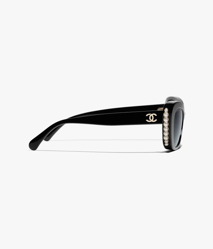 Occhiali da sole Cat Eye in acetato e vetro nero perlato e oro con lenti grigie sfumate