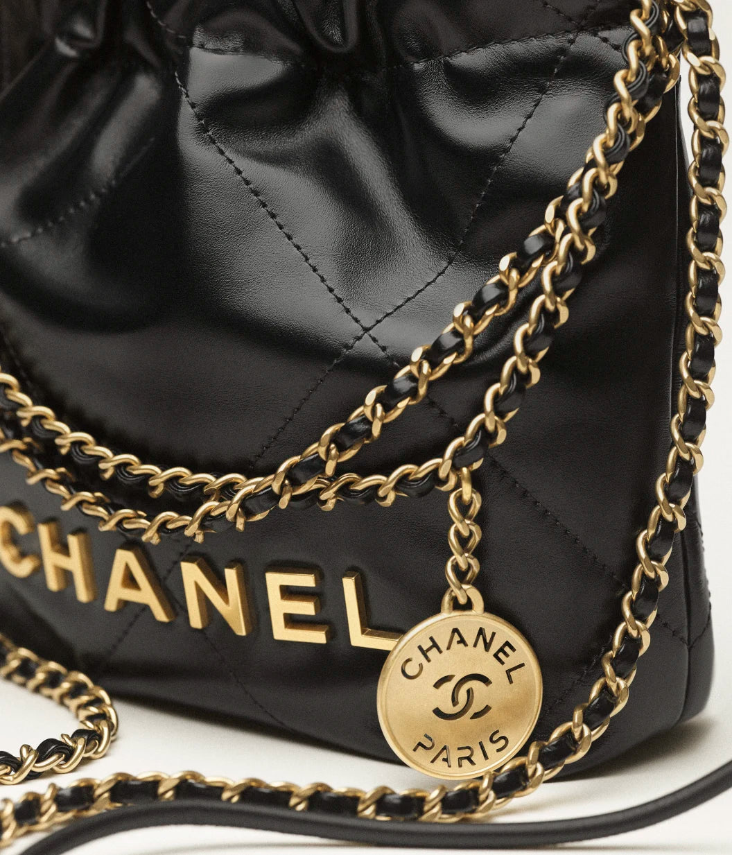 Mini 22 bag in shiny black calfskin and gold-tone metal