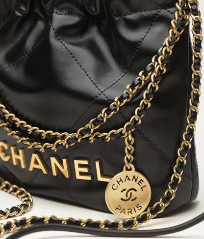 Mini 22 bag in shiny black calfskin and gold-tone metal