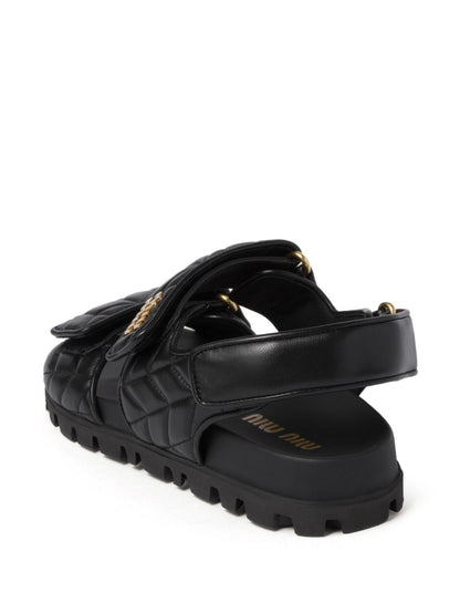 Black quilted leather sandals