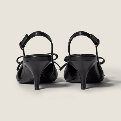 Black leather slingback pumps with bow