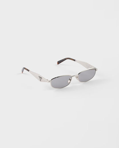 Silver acetate oval sunglasses with gray lenses