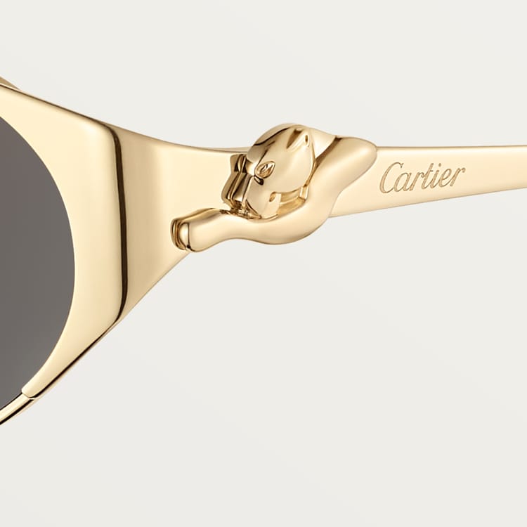 Women's oval Panthère de CT sunglasses with gray lenses and gold-tone finish