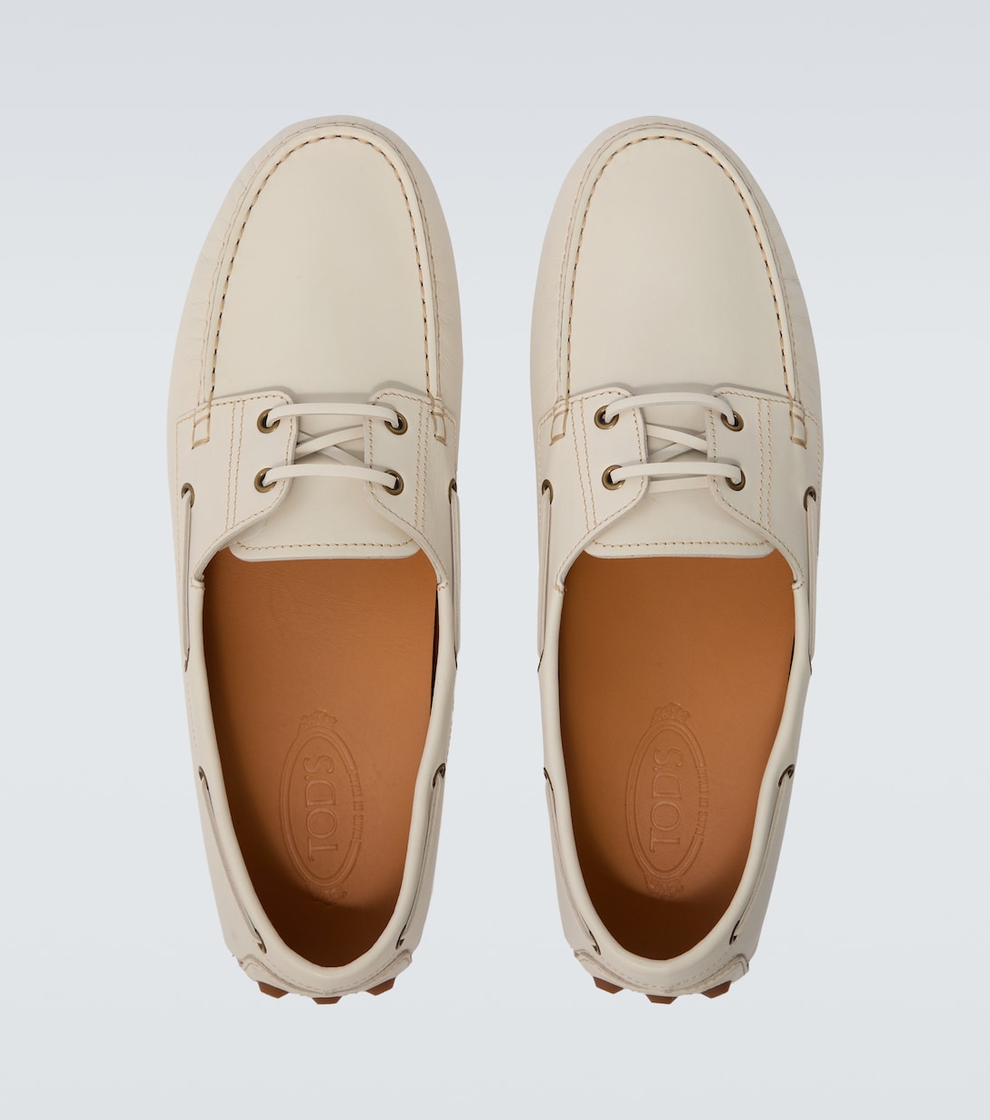 White leather loafers