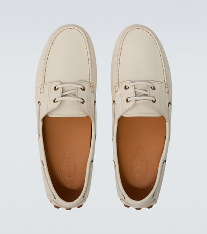 White leather loafers
