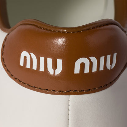 White/brown leather sneakers