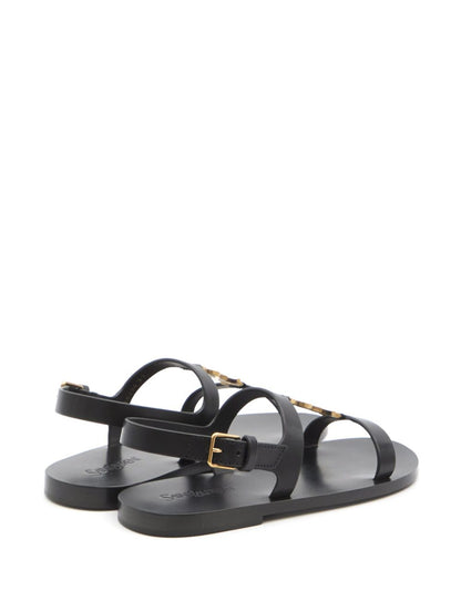 Cassandre buckled slingback sandals in black leather