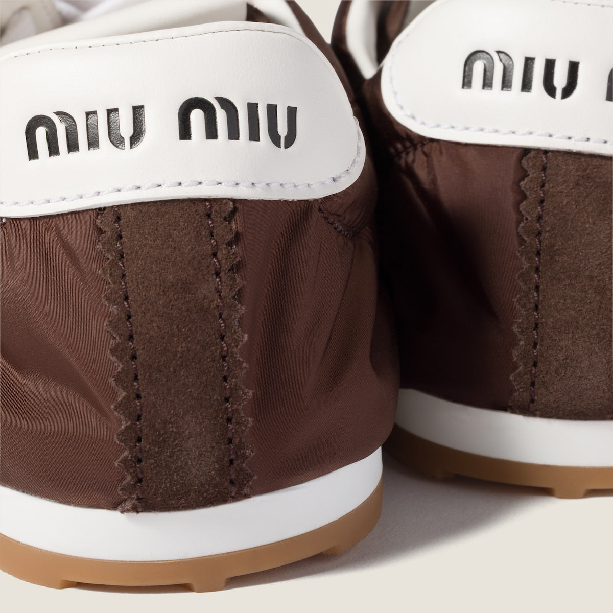 Plume sneakers in technical fabric and burnt suede