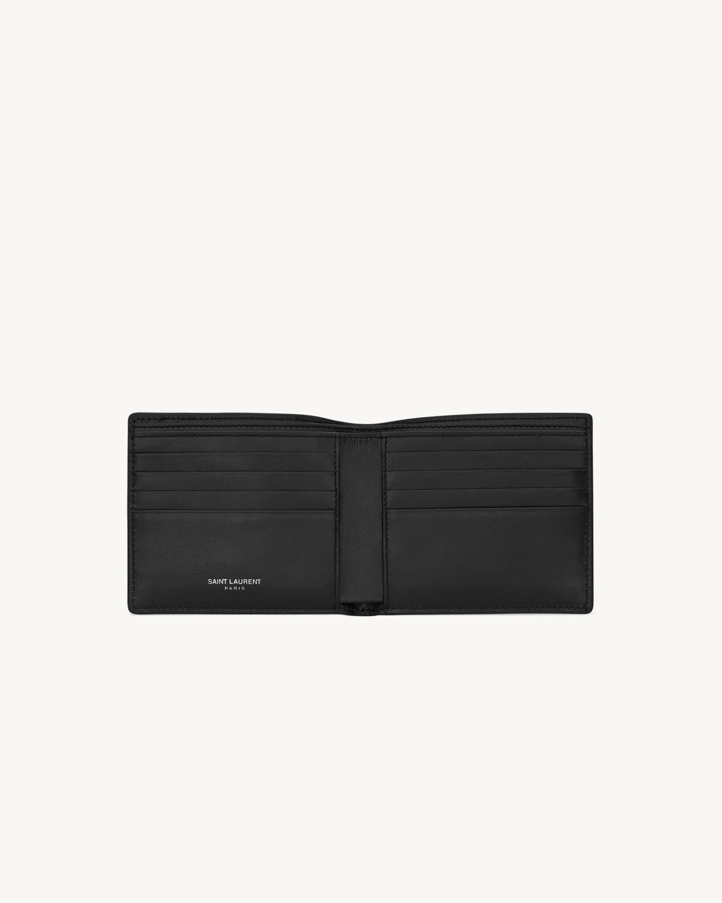 CASSANDRE East/West wallet in black smooth leather
